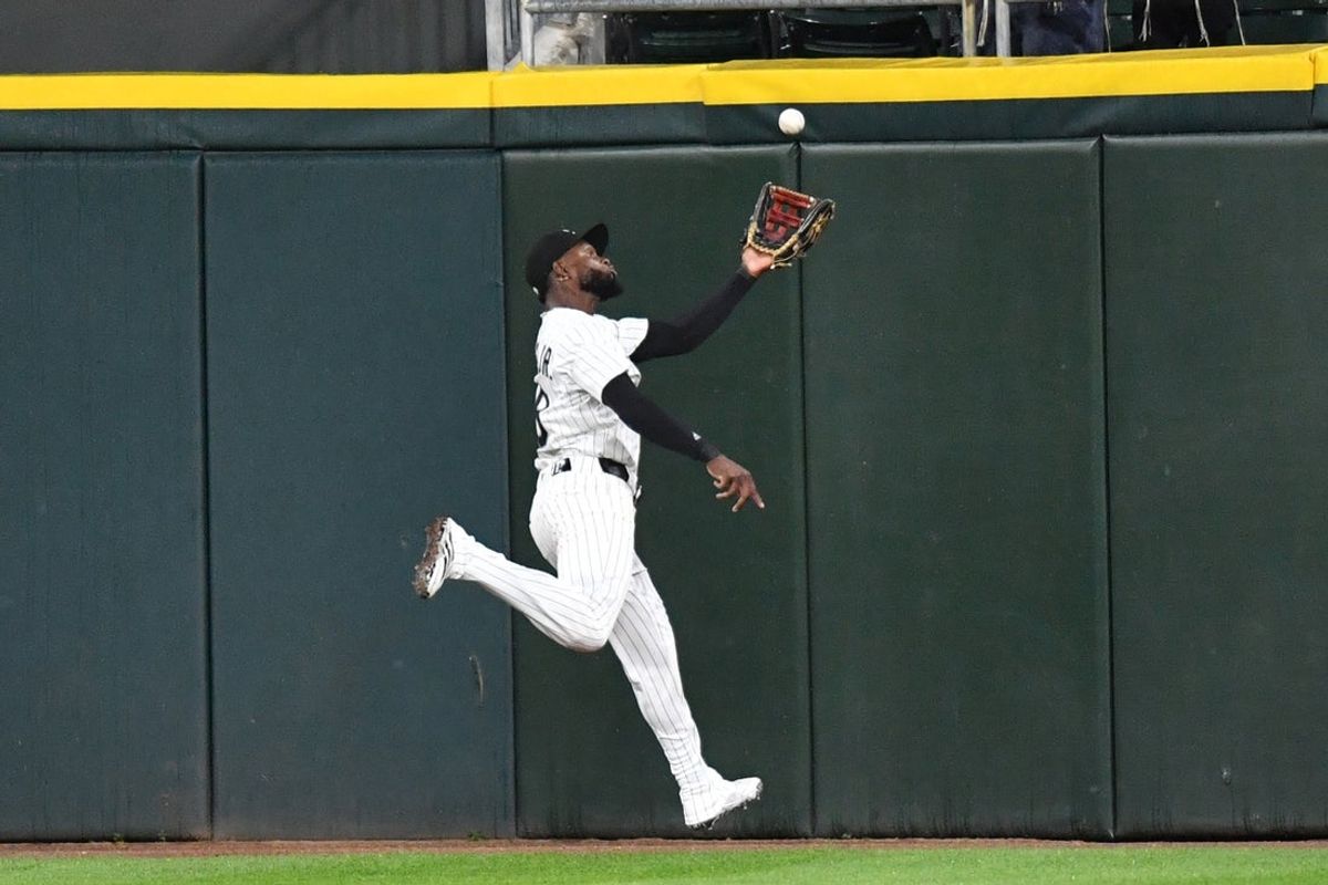 Jun 24, 2025; Chicago, Illinois, USA; Chicago White Sox center fielder Luis Robert Jr. (88) catches Arizona Diamondbacks catcher Jose Herrera’s (not pictured) RBI sacrifice fly ball during the seventh inning at Rate Field. Mandatory Credit: Patrick Gorski-Imagn Images