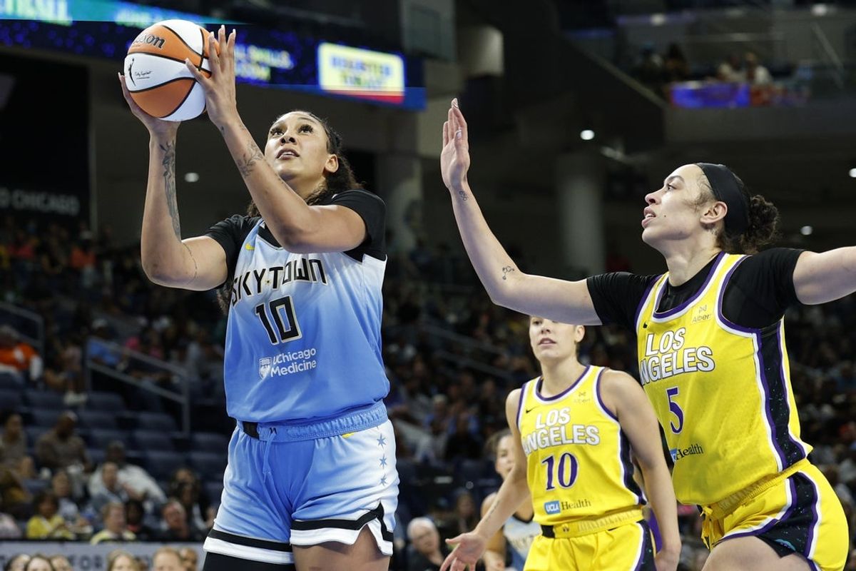 Jun 24, 2025; Chicago, Illinois, USA; Chicago Sky center Kamilla Cardoso (10) drives to the basket against the Los Angeles Sparks during the first half at Wintrust Arena. Mandatory Credit: Kamil Krzaczynski-Imagn Images