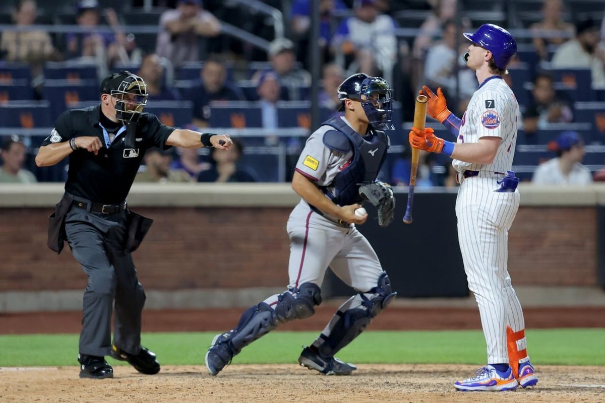 Jun 24, 2025; New York City, New York, USA; New York Mets third baseman Brett Baty (7) reacts as home plate umpire Adam Hamari (78) calls him out on strikes during the ninth inning against the Atlanta Braves at Citi Field. Mandatory Credit: Brad Penner-Imagn Images