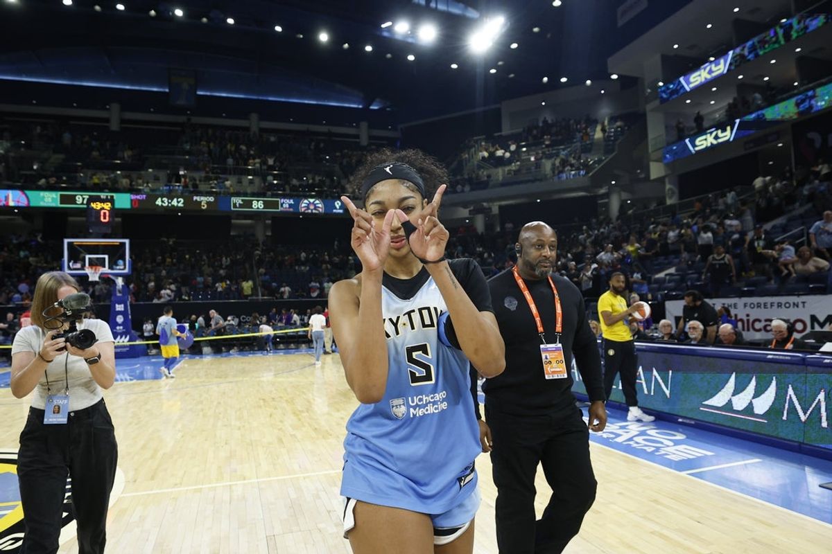 Jun 24, 2025; Chicago, Illinois, USA; Chicago Sky forward Angel Reese (5) celebrates the team's win against the Los Angeles Sparks at Wintrust Arena. Mandatory Credit: Kamil Krzaczynski-Imagn Images