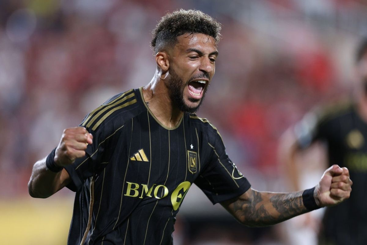 Jun 24, 2025; Orlando, Florida, USA; LAFC forward Denis Bouanga (99) reacts after scoring a goal against CR Flamengo during a group stage match of the 2025 FIFA Club World Cup at Camping World Stadium. Mandatory Credit: Nathan Ray Seebeck-Imagn Images