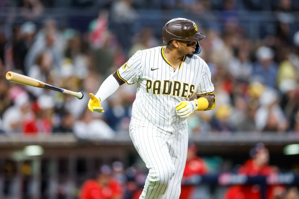 Jun 24, 2025; San Diego, California, USA; San Diego Padres catcher Martin Maldonado (15) flips his bat after hitting a one-run home run during the fifth inning against the Washington Nationals at Petco Park. Mandatory Credit: David Frerker-Imagn Images