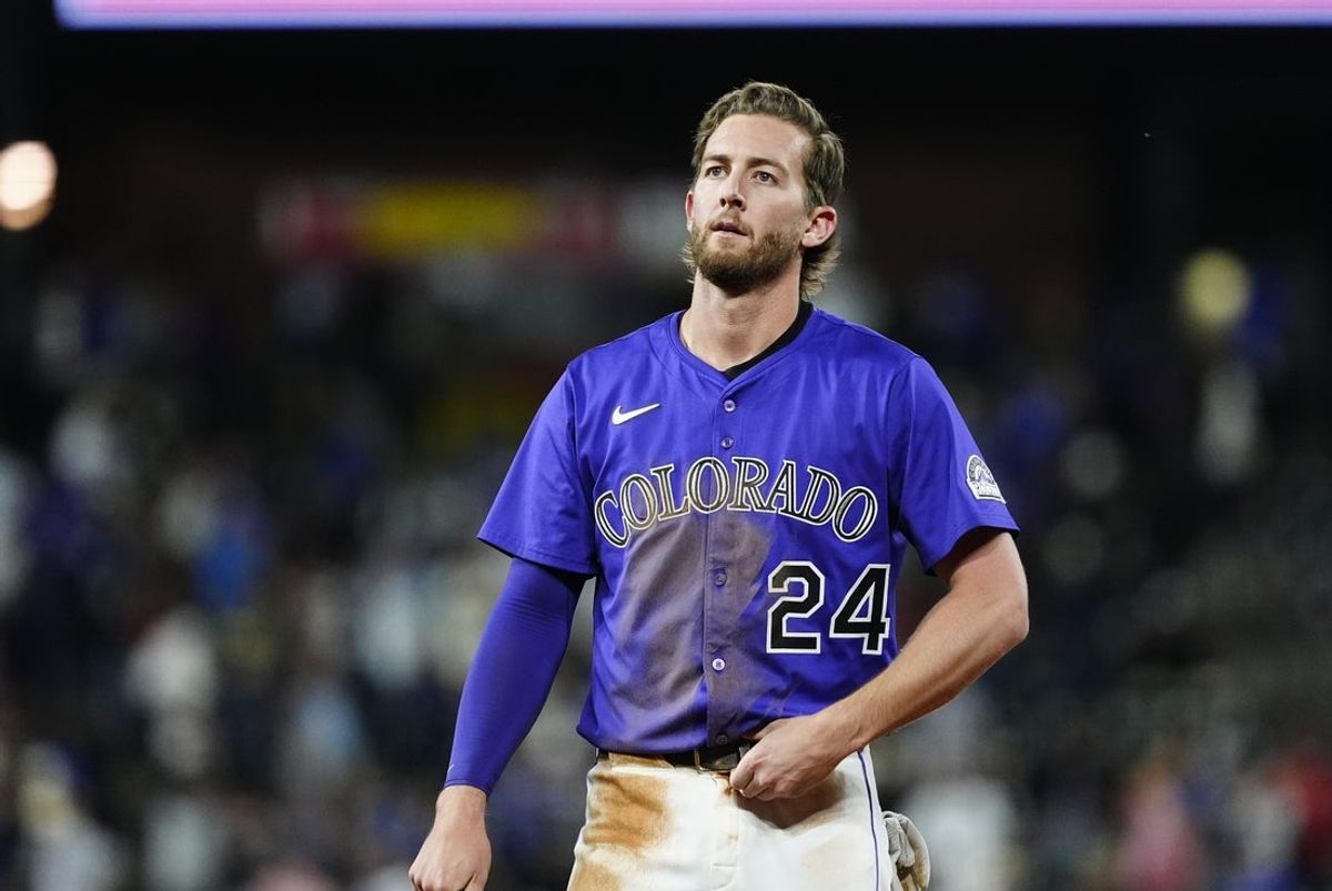 Jun 24, 2025; Denver, Colorado, USA; Colorado Rockies third baseman Ryan McMahon (24) following the loss to the Los Angeles Dodgers at Coors Field. Mandatory Credit: Ron Chenoy-Imagn Images