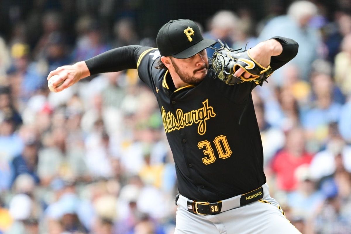 Jun 25, 2025; Milwaukee, Wisconsin, USA;  Pittsburgh Pirates starting pitcher Paul Skenes (30) throws a pitch in the first inning against the Milwaukee Brewers at American Family Field. Mandatory Credit: Benny Sieu-Imagn Images
