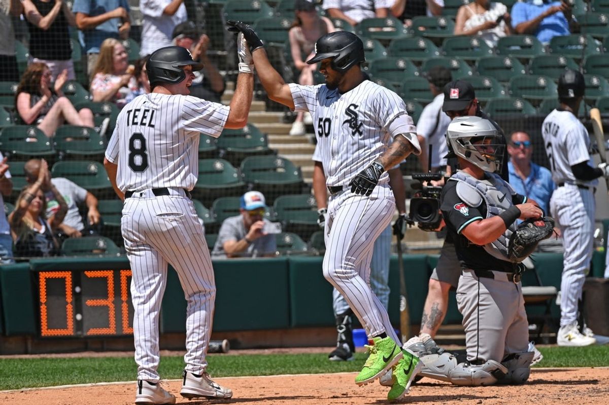 Jun 25, 2025; Chicago, Illinois, USA; Chicago White Sox second baseman Lenyn Sosa (50) celebrates with catcher Kyle Teel (8) after hitting a two-run home run during the fourth inning against the Arizona Diamondbacks at Rate Field. Mandatory Credit: Patrick Gorski-Imagn Images
