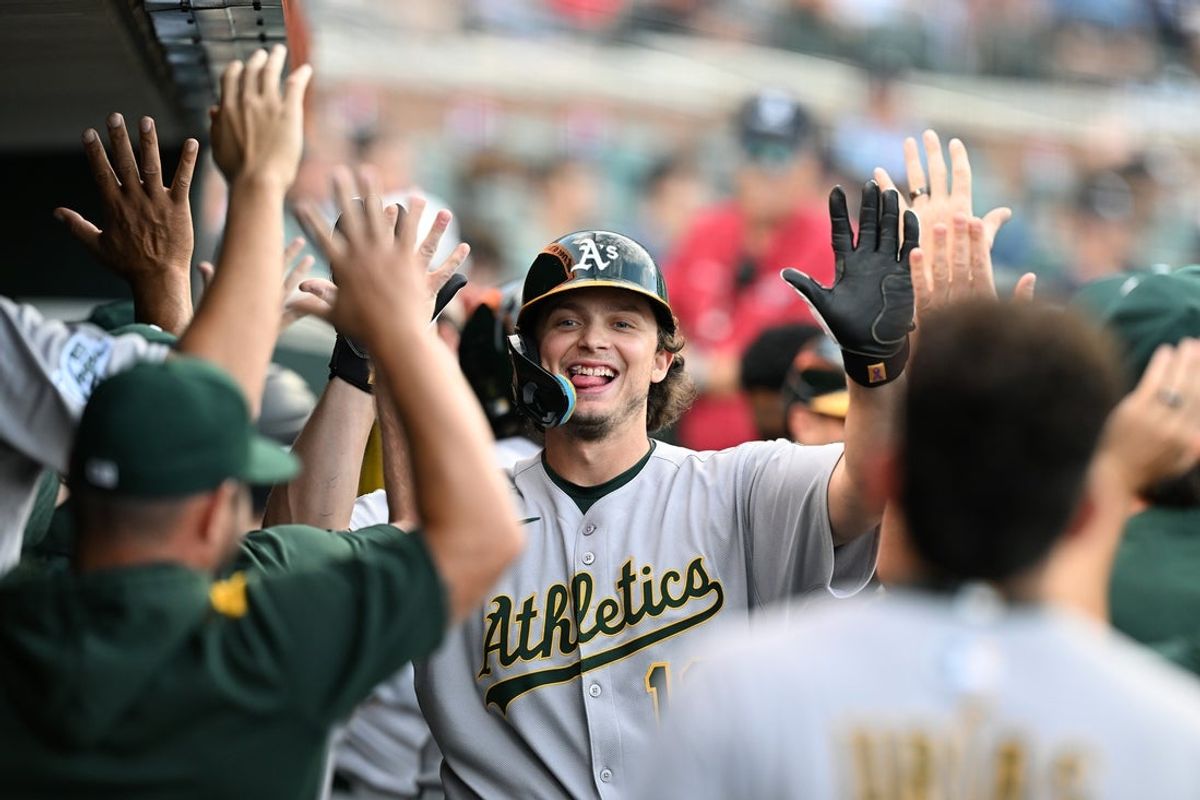 Jun 25, 2025; Detroit, Michigan, USA; Athletics first baseman Nick Kurtz (16) celebrates in the dugout after hitting a three-run home run against the Detroit Tigers in the third inning at Comerica Park. Mandatory Credit: Lon Horwedel-Imagn Images
