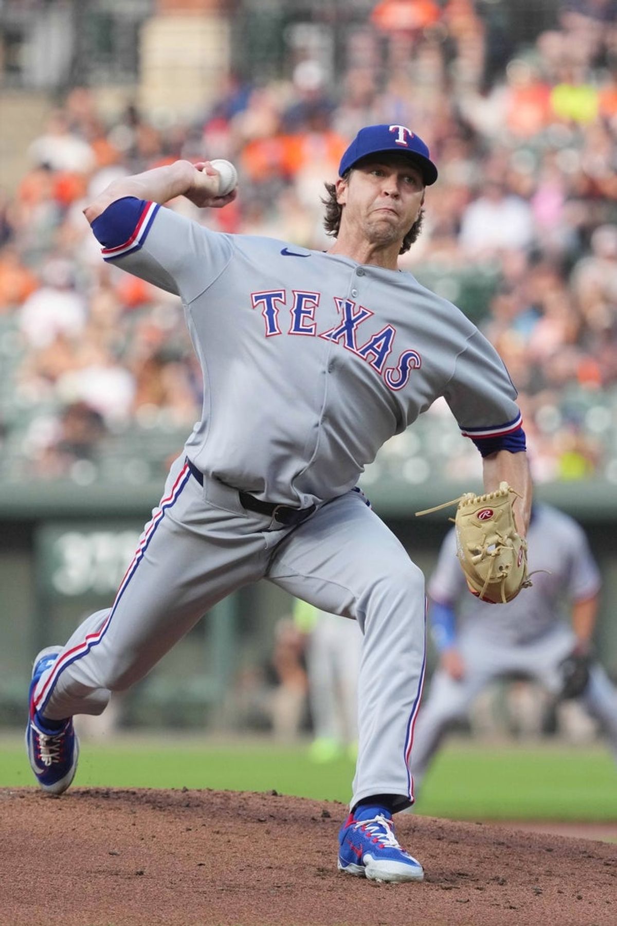 Jun 25, 2025; Baltimore, Maryland, USA; Texas Rangers pitcher Jacob deGrom (48) delivers during the first inning against the Baltimore Orioles at Oriole Park at Camden Yards. Mandatory Credit: Mitch Stringer-Imagn Images