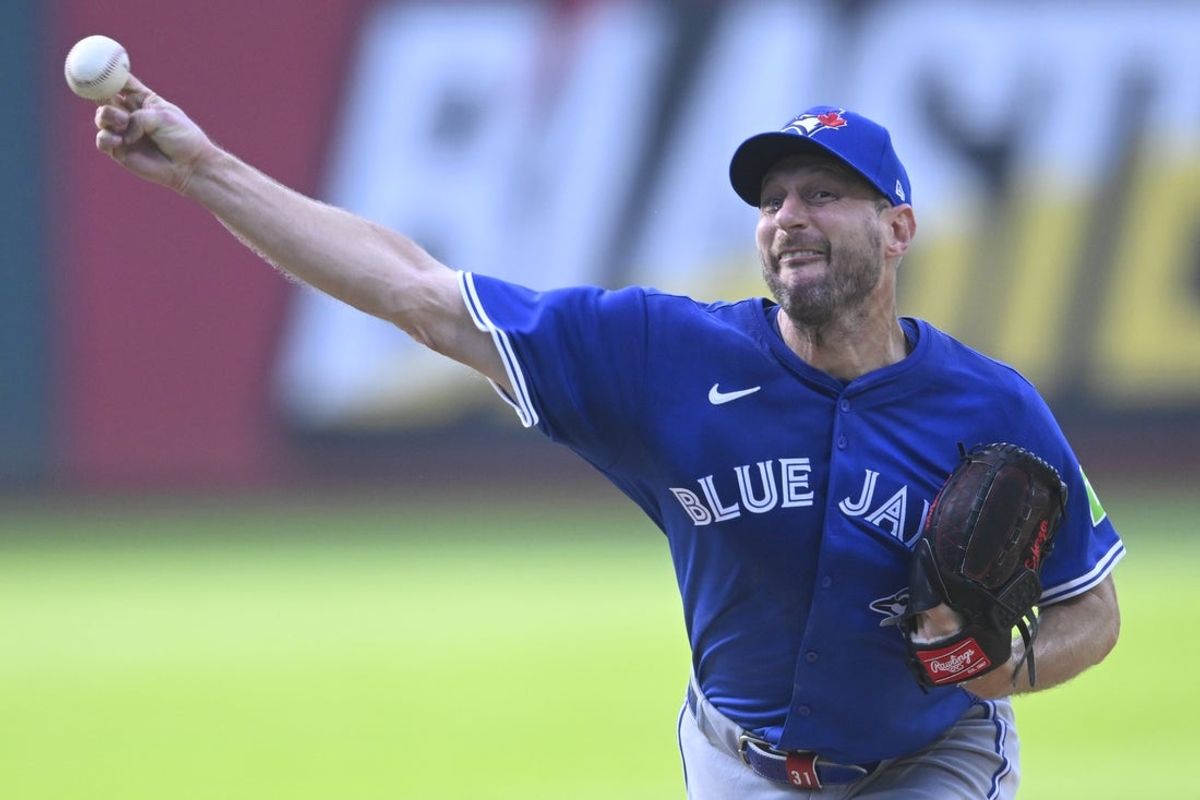 Jun 25, 2025; Cleveland, Ohio, USA; Toronto Blue Jays starting pitcher Max Scherzer (31) delivers a pitch in the first inning against the Cleveland Guardians at Progressive Field. Mandatory Credit: David Richard-Imagn Images