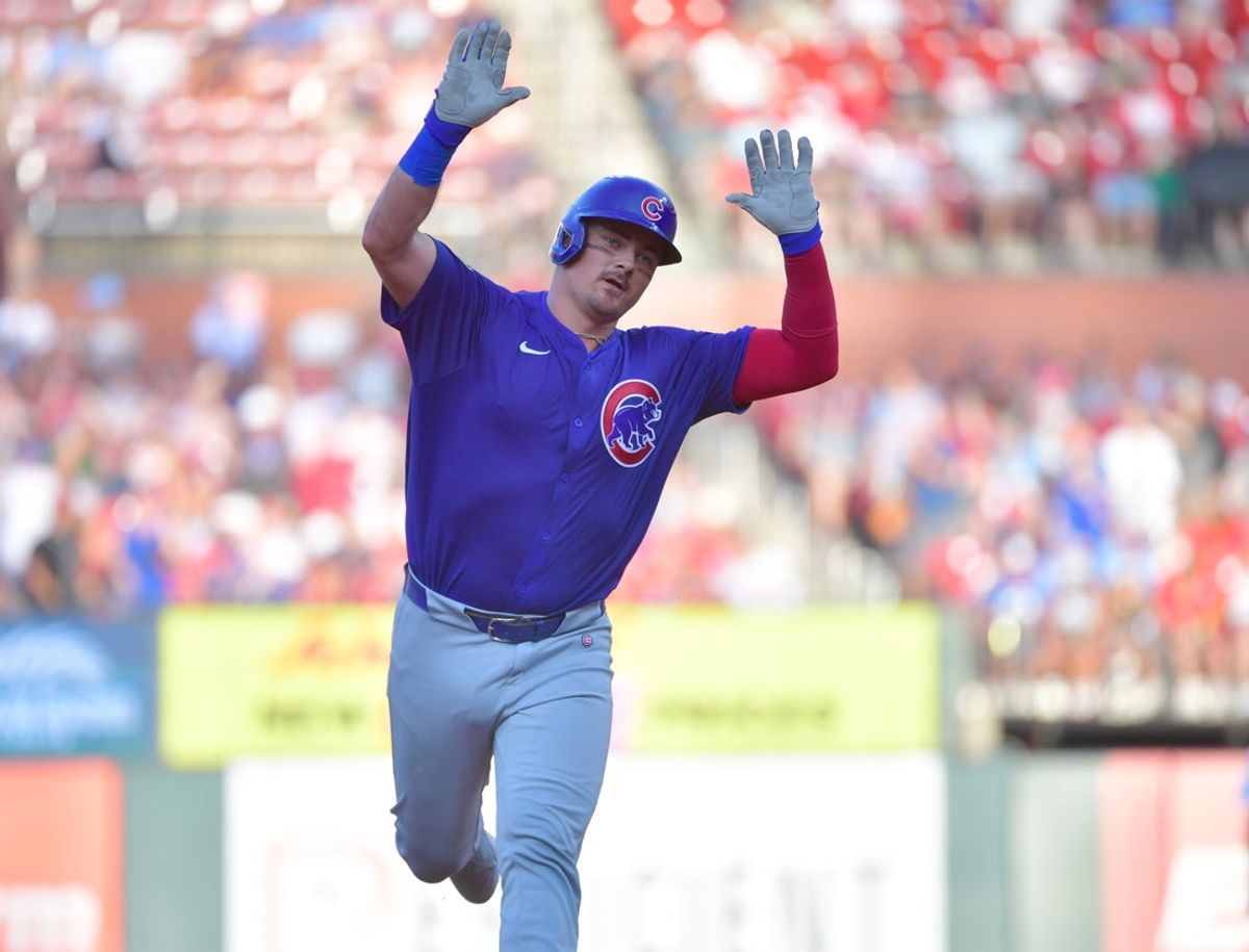 Jun 25, 2025; St. Louis, Missouri, USA; Chicago Cubs catcher Reese McGuire (20) celebrates his second inning two run homer against the St. Louis Cardinals as he heads to third base at Busch Stadium. Mandatory Credit: Tim Vizer-Imagn Images