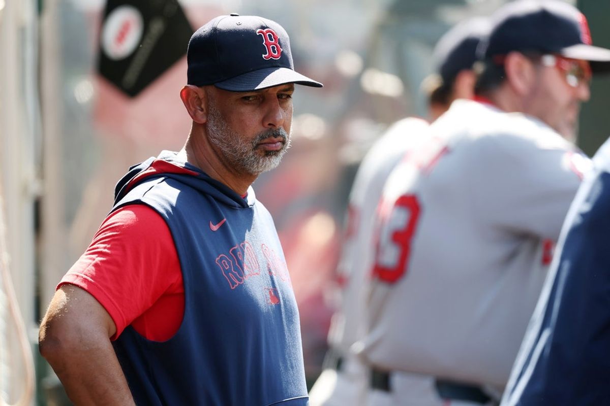 Jun 25, 2025; Anaheim, California, USA;  Boston Red Sox manager Alex Cora (13) looks down in the dugout during the eighth inning against the Los Angeles Angels at Angel Stadium. Mandatory Credit: Kiyoshi Mio-Imagn Images