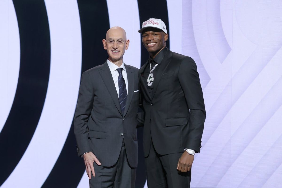 Jun 25, 2025; Brooklyn, NY, USA;  Cedric Coward stands with NBA commissioner Adam Silver after being selected as the 11th pick by the Portland Trail Blazers in the first round of the 2025 NBA Draft at Barclays Center. Mandatory Credit: Brad Penner-Imagn Images
