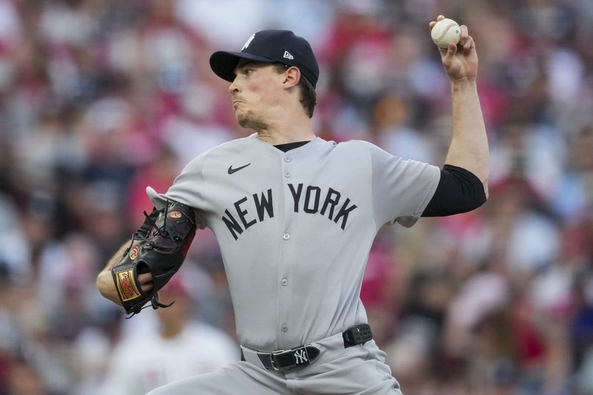 Jun 25, 2025; Cincinnati, Ohio, USA; New York Yankees pitcher Max Fried throws against the Cincinnati Reds in the third inning at Great American Ball Park. Mandatory Credit: Aaron Doster-Imagn Images