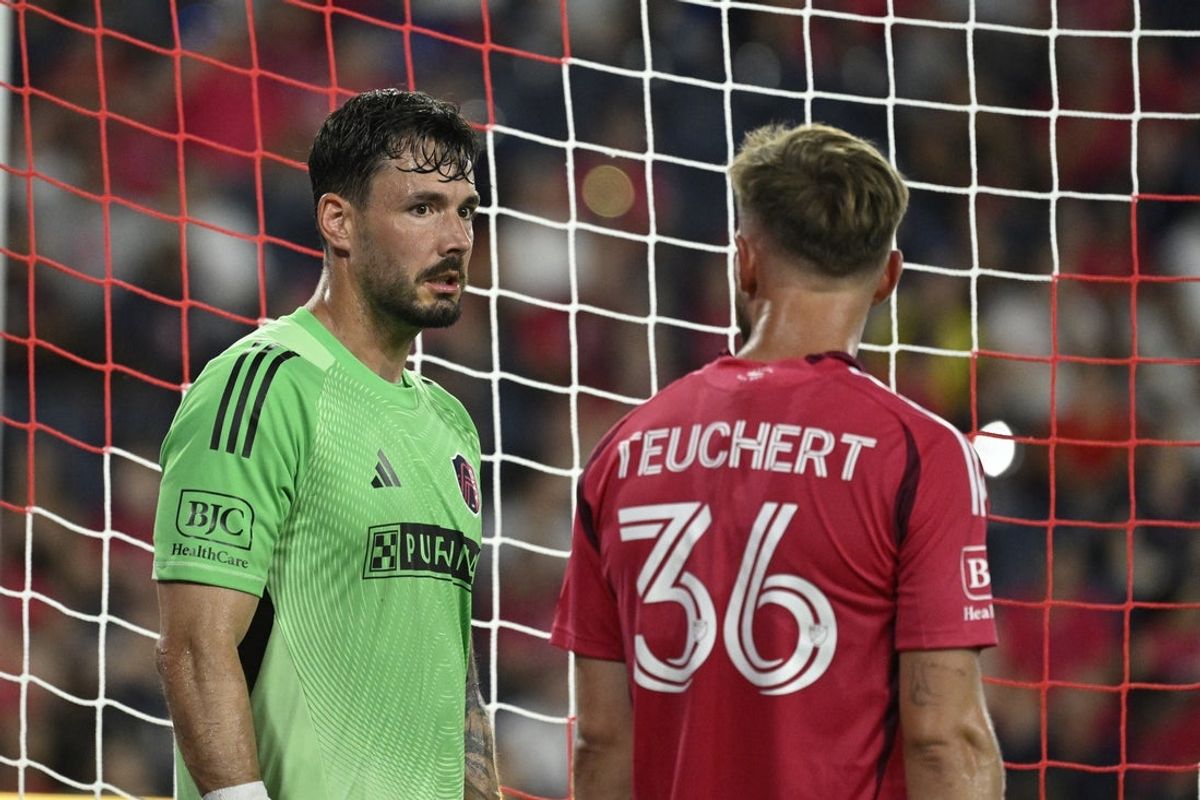 Jun 25, 2025; St. Louis, Missouri, USA; St. Louis CITY SC goalkeeper Roman Burki (1) speaks with St. Louis CITY SC midfielder Cedric Teuchert (36) in the second half at Energizer Park. Mandatory Credit: Joe Puetz-Imagn Images