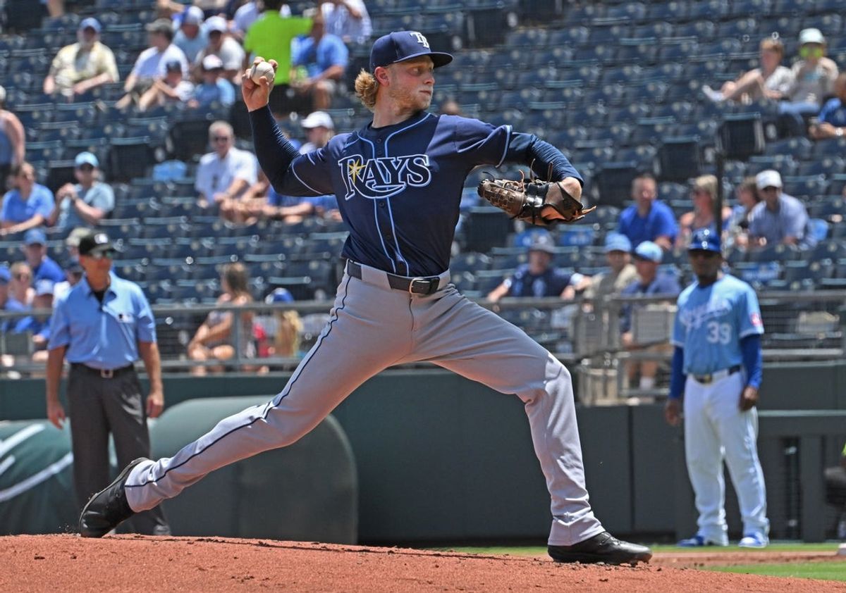 Jun 26, 2025; Kansas City, Missouri, USA;  Tampa Bay Rays starting pitcher Shane Baz (11) throws a pitch in the first inning against the Kansas City Royals at Kauffman Stadium. Mandatory Credit: Peter Aiken-Imagn Images