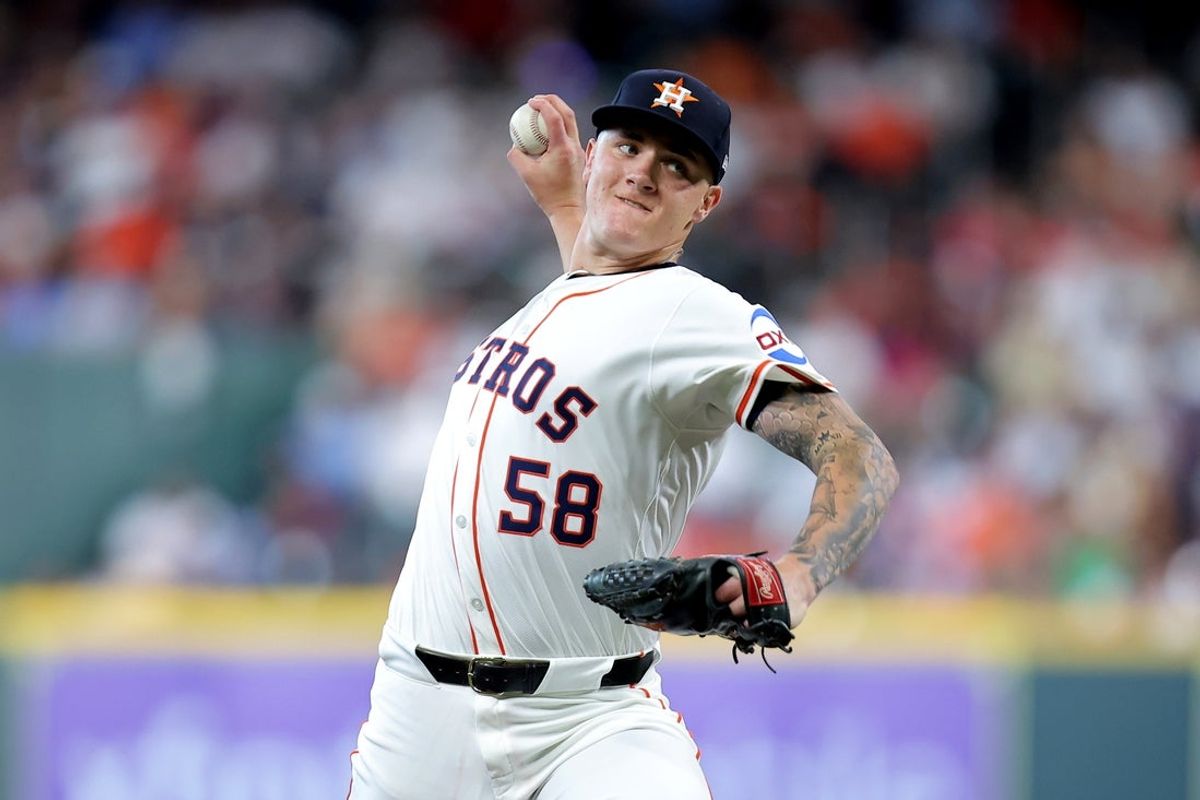 Jun 26, 2025; Houston, Texas, USA; Houston Astros starting pitcher Hunter Brown (58) delivers a pitch against the Philadelphia Phillies during the first inning at Daikin Park. Mandatory Credit: Erik Williams-Imagn Images