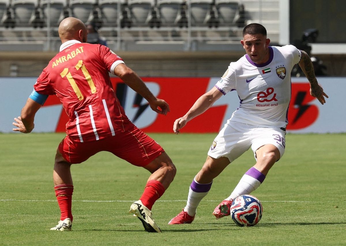 [Subscription Customers Only] Jun 26, 2025; Washington, District of Columbia, USA; Wydad AC forward Nordin Amrabat (11) in action with Al Ain FC defender Facundo Zabala (36) during a group stage match of the 2025 FIFA Club World Cup at Audi Field. Mandatory Credit: Kevin Lamarque-Reuters via Imagn Images