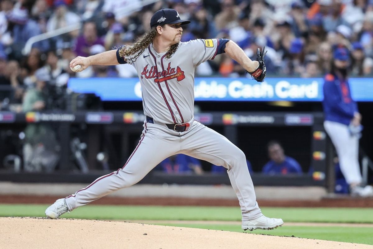 Jun 26, 2025; New York City, New York, USA;  Atlanta Braves starting pitcher Grant Holmes (66) pitches in the first inning against the New York Mets at Citi Field. Mandatory Credit: Wendell Cruz-Imagn Images