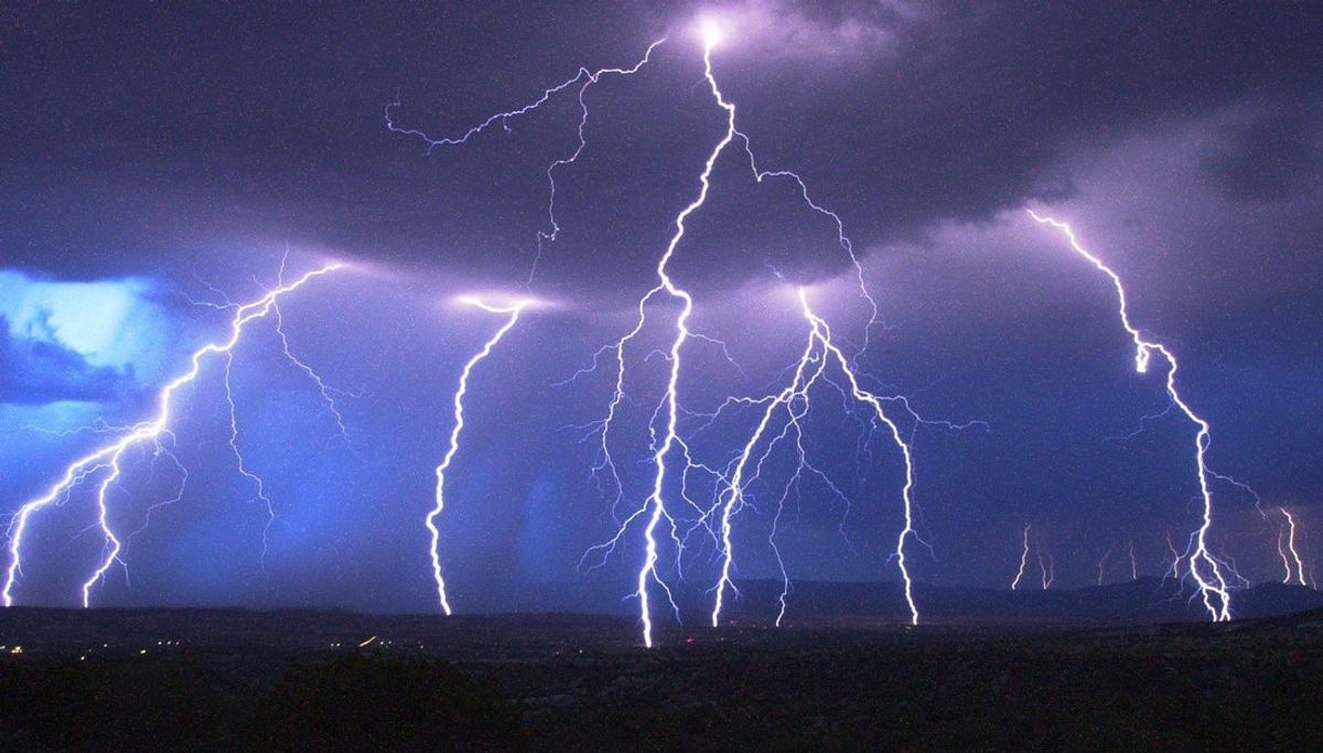Lightning bolts strike the town of Camp Verde, Ariz., on Aug. 1, 2000. This powerful electrical storm produced damaging winds and heavy rains, causing power outages all over the Verde Valley and throughout Yavapai County.