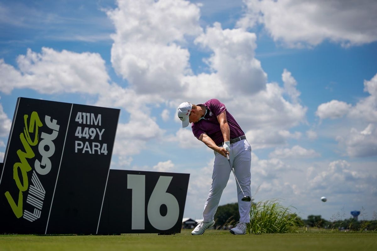 Jun 27, 2025; Carrollton, Texas, USA; Caleb Surratt plays his shot from the 16th tee during the first round of the LIV Golf Dallas golf tournament at Maridoe Golf Club. Mandatory Credit: Raymond Carlin III-Imagn Images