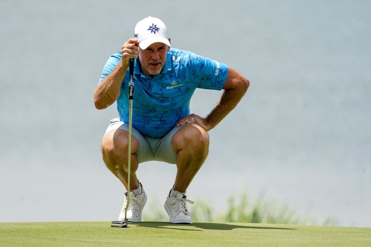 Jun 27, 2025; Carrollton, Texas, USA; Lee Westwood lines up a putt on the 15th green during the first round of the LIV Golf Dallas golf tournament at Maridoe Golf Club. Mandatory Credit: Raymond Carlin III-Imagn Images