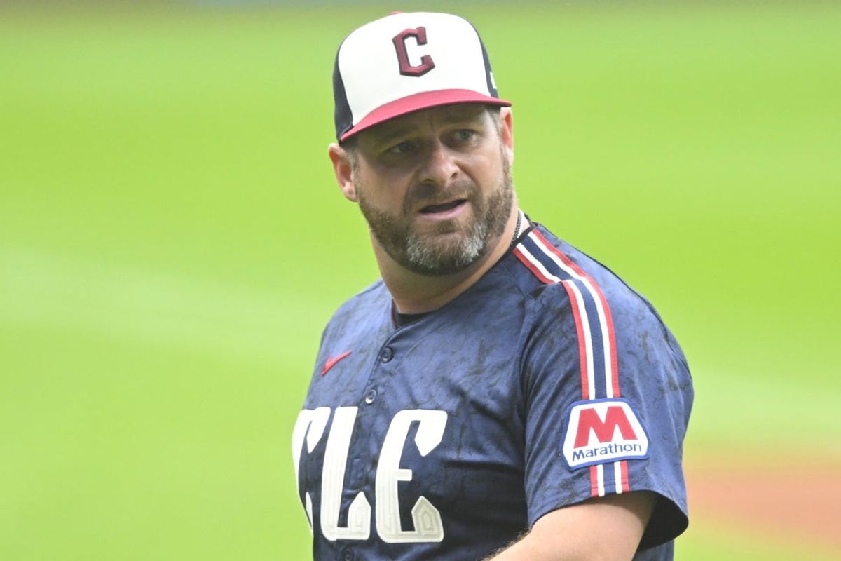 Jun 27, 2025; Cleveland, Ohio, USA; Cleveland Guardians manager Stephen Vogt (12) walks on the field in the first inning against the St. Louis Cardinals at Progressive Field. Mandatory Credit: David Richard-Imagn Images