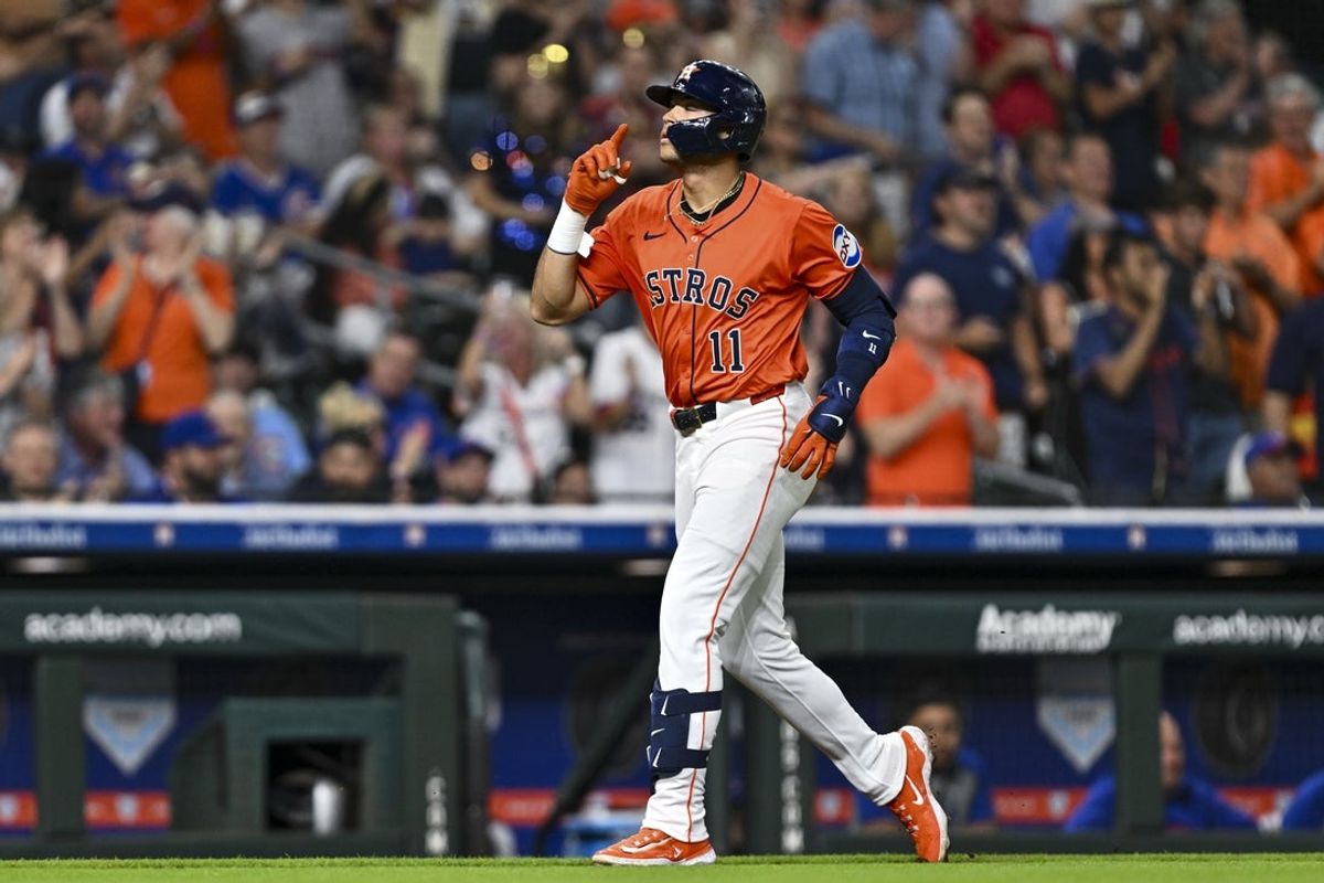 Jun 27, 2025; Houston, Texas, USA; Houston Astros outfielder Cam Smith (11) celebrates after hitting a three run home run in the fourth inning against the Chicago Cubs at Daikin Park. Mandatory Credit: Maria Lysaker-Imagn Images