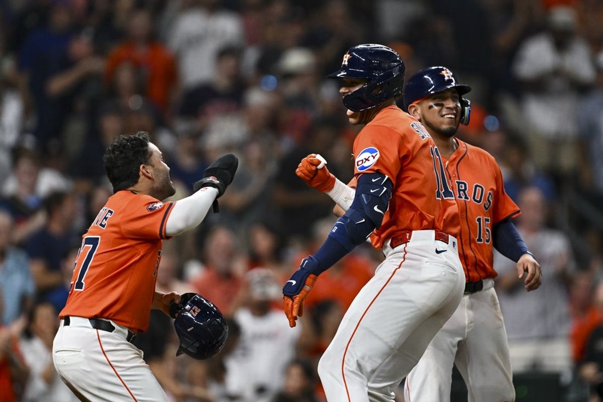 Jun 27, 2025; Houston, Texas, USA; Houston Astros outfielder Cam Smith (11) celebrates with second baseman Jose Altuve (27) after hitting a three run home run in the fourth inning against the Chicago Cubs at Daikin Park. Mandatory Credit: Maria Lysaker-Imagn Images