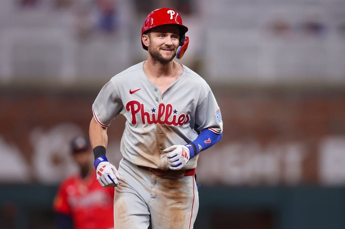 Jun 27, 2025; Atlanta, Georgia, USA; Philadelphia Phillies shortstop Trea Turner (7) celebrates after a home run against the Atlanta Braves in the ninth inning at Truist Park. Mandatory Credit: Brett Davis-Imagn Images