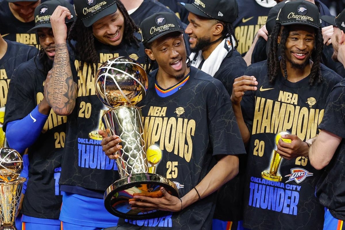 Jun 22, 2025; Oklahoma City, Oklahoma, USA; Oklahoma City Thunder forward Jalen Williams (8) holds the NBA Larry O'Brien Championship Trophy at the end of game seven of the 2025 NBA Finals after defeating the Indiana Pacers at Paycom Center. Mandatory Credit: Alonzo Adams-Imagn Images