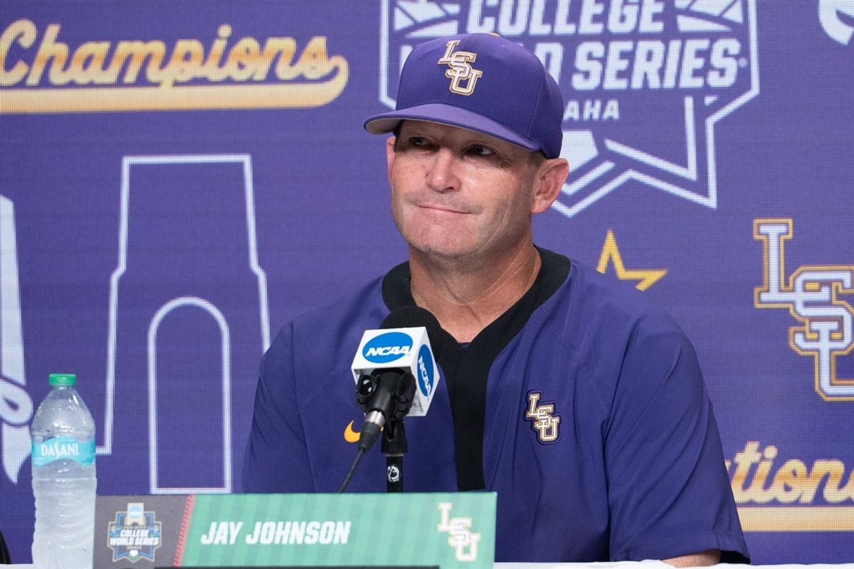 Jun 22, 2025; Omaha, Neb, USA;  LSU Tigers head coach Jay Johnson (2) meets with the press after the game against the Coastal Carolina Chanticleers at Charles Schwab Field. Mandatory Credit: Steven Branscombe-Imagn Images