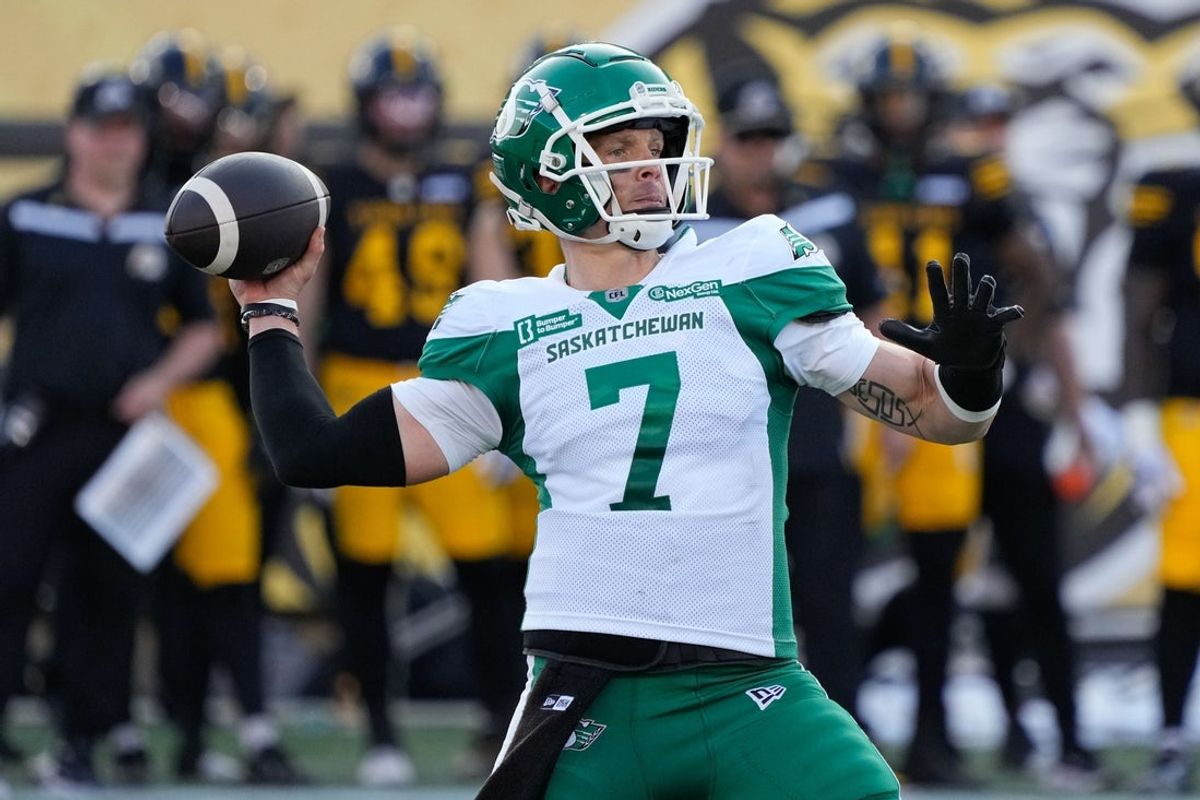 Jun 14, 2025; Hamilton, Ontario, Canada; Saskatchewan Roughriders quarterback Trevor Harris (7) goes to throw a pass against the Hamilton Tiger-Cats at Hamilton Stadium. Mandatory Credit: John E. Sokolowski-Imagn Images