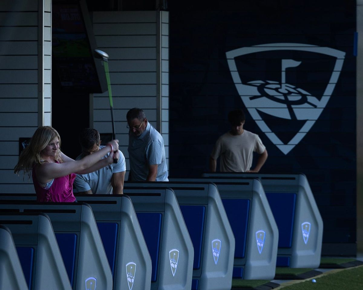 People are seen at TopGolf in Panama City Beach, Fla., June 27, 2025. (Tyler Orsburn/News Herald)