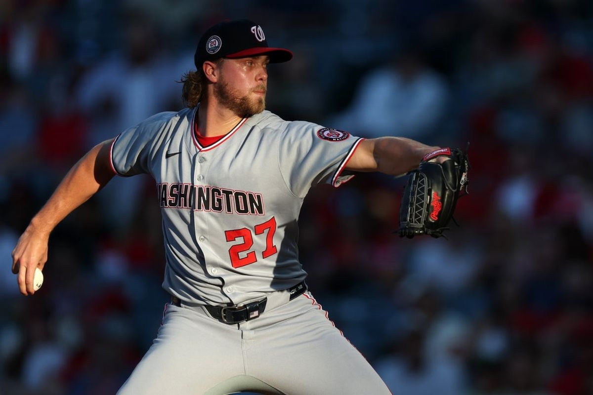 Jun 27, 2025; Anaheim, California, USA;  Washington Nationals starting pitcher Jake Irvin (27) pitches during the third inning against the Los Angeles Angels at Angel Stadium. Mandatory Credit: Kiyoshi Mio-Imagn Images