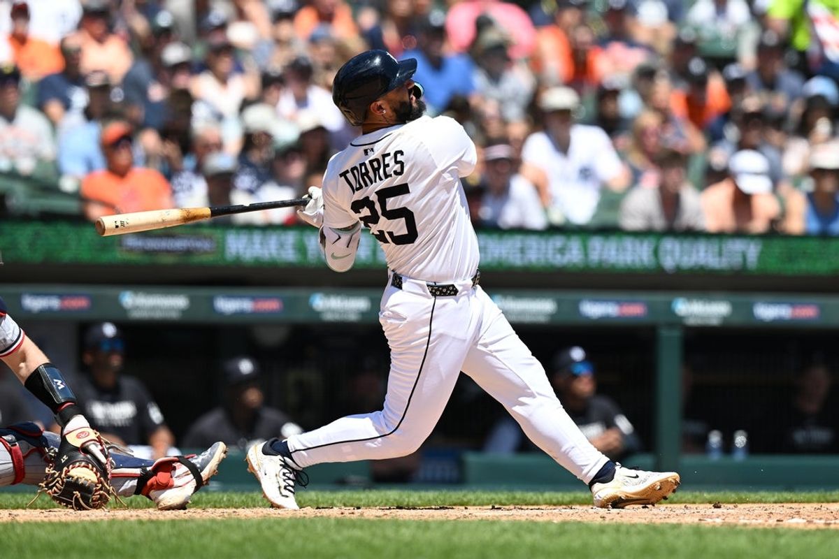 Jun 28, 2025; Detroit, Michigan, USA;  Detroit Tigers second baseman Gleyber Torres (25) hits a two-run home run against the Minnesota Twins in the fourth inning at Comerica Park. Mandatory Credit: Lon Horwedel-Imagn Images