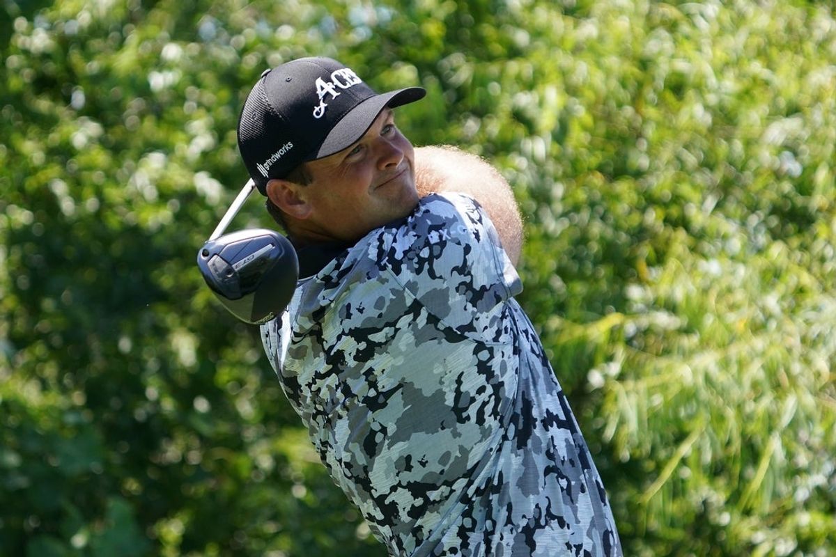 Jun 28, 2025; Carrollton, Texas, USA; Patrick Reed plays his shot from the second tee during the second round of the LIV Golf Dallas golf tournament at Maridoe Golf Club. Mandatory Credit: Raymond Carlin III-Imagn Images