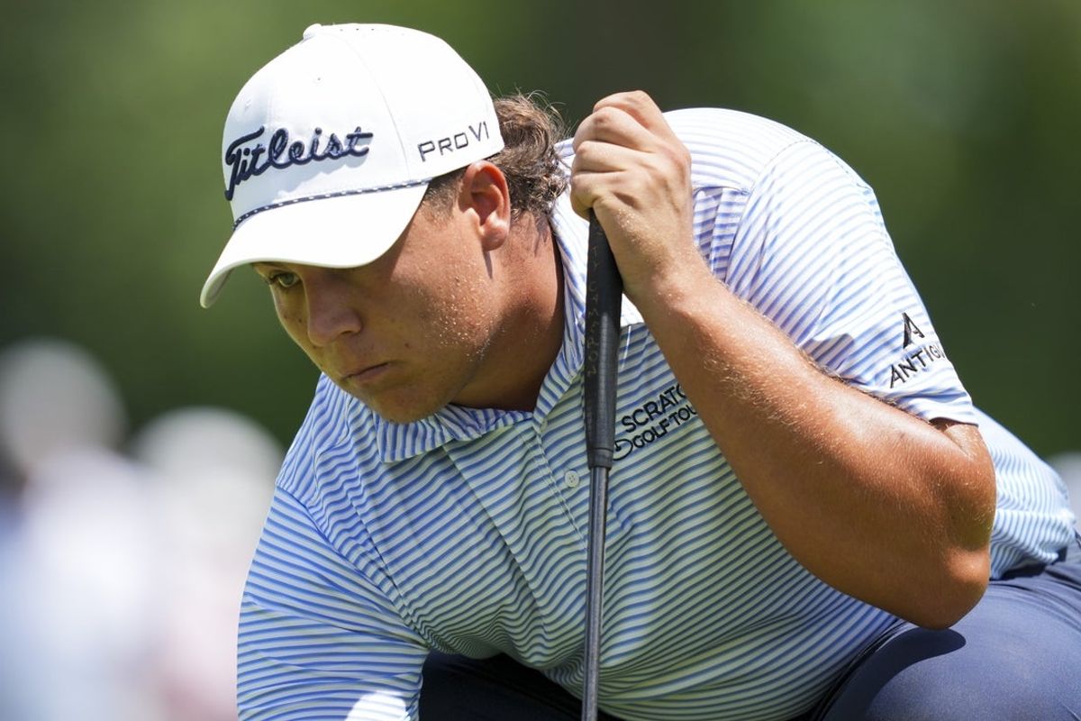 Jun 28, 2025; Detroit, Michigan, USA; Aldrich Potgieter lines up a putt on the fourth green during the third round of the Rocket Mortgage Classic golf tournament. Mandatory Credit: Aaron Doster-Imagn Images
