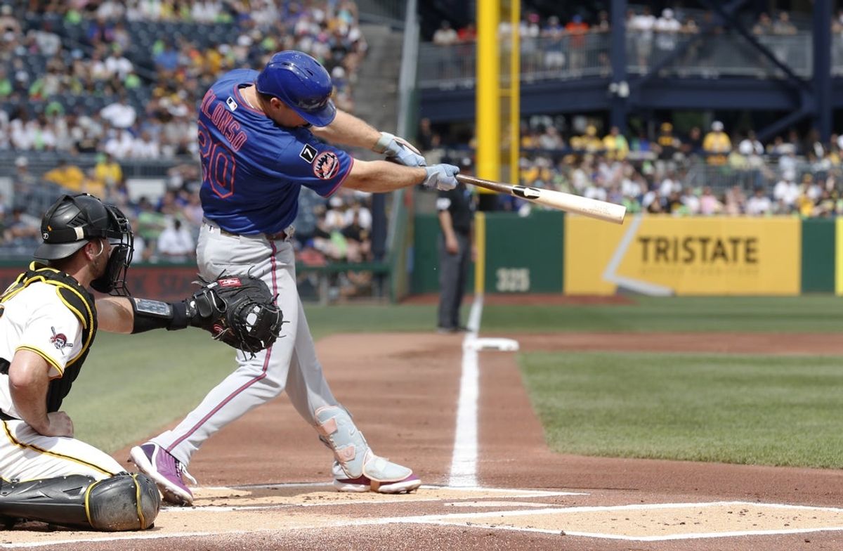 Jun 28, 2025; Pittsburgh, Pennsylvania, USA; New York Mets first baseman Pete Alonso (20) hits a single against the Pittsburgh Pirates during the first inning at PNC Park. Mandatory Credit: Charles LeClaire-Imagn Images