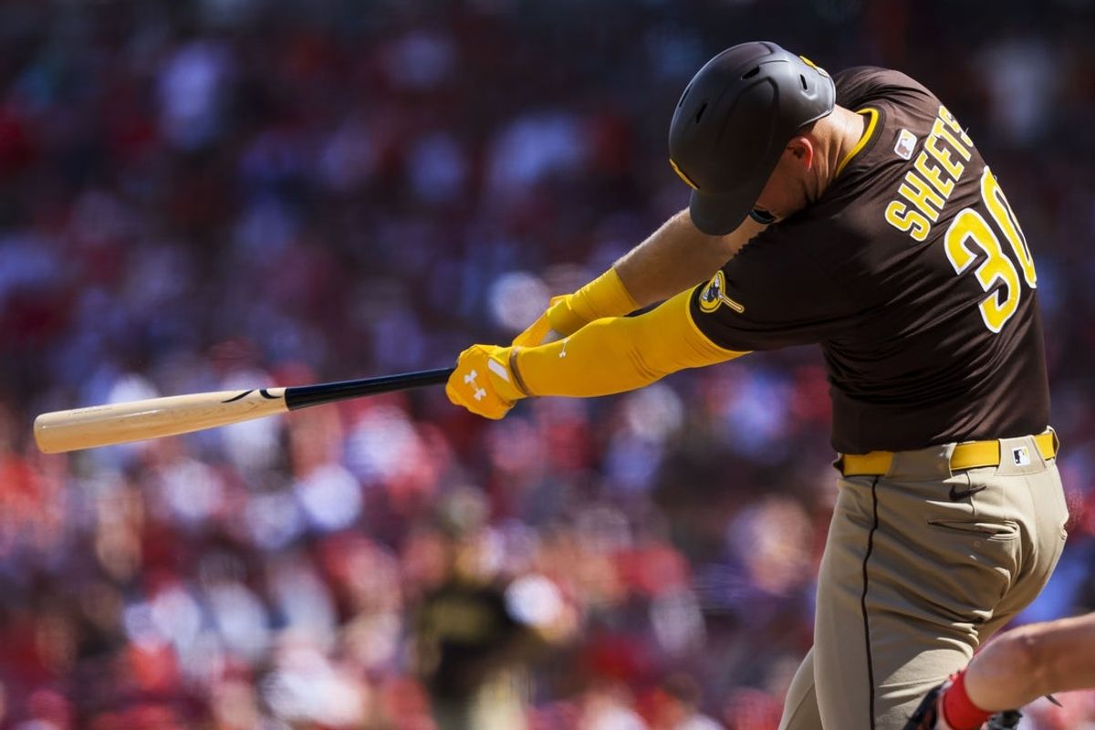 Jun 28, 2025; Cincinnati, Ohio, USA; San Diego Padres outfielder Gavin Sheets (30) hits a double in the second inning against the Cincinnati Reds at Great American Ball Park. Mandatory Credit: Katie Stratman-Imagn Images