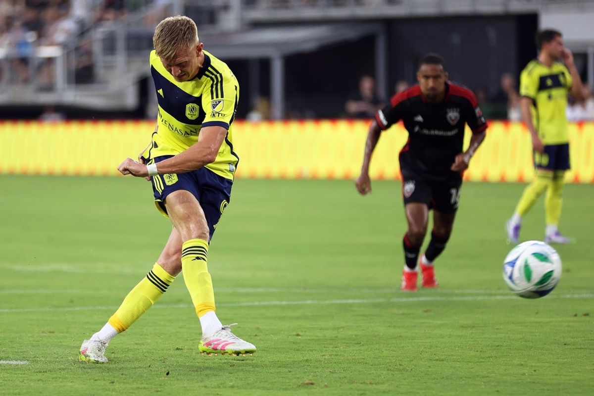Jun 28, 2025; Washington, District of Columbia, USA; Nashville SC forward Sam Surridge (9) scores during the first half against the D.C. United at Audi Field. Mandatory Credit: Daniel Kucin Jr.-Imagn Images