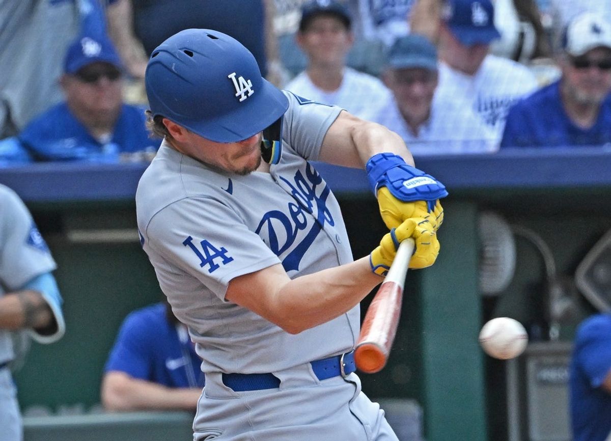 Jun 28, 2025; Kansas City, Missouri, USA;  Los Angeles Dodgers first baseman Enrique Hernandez (8) hits a two-run single in the ninth inning against the Kansas City Royals at Kauffman Stadium. Mandatory Credit: Peter Aiken-Imagn Images