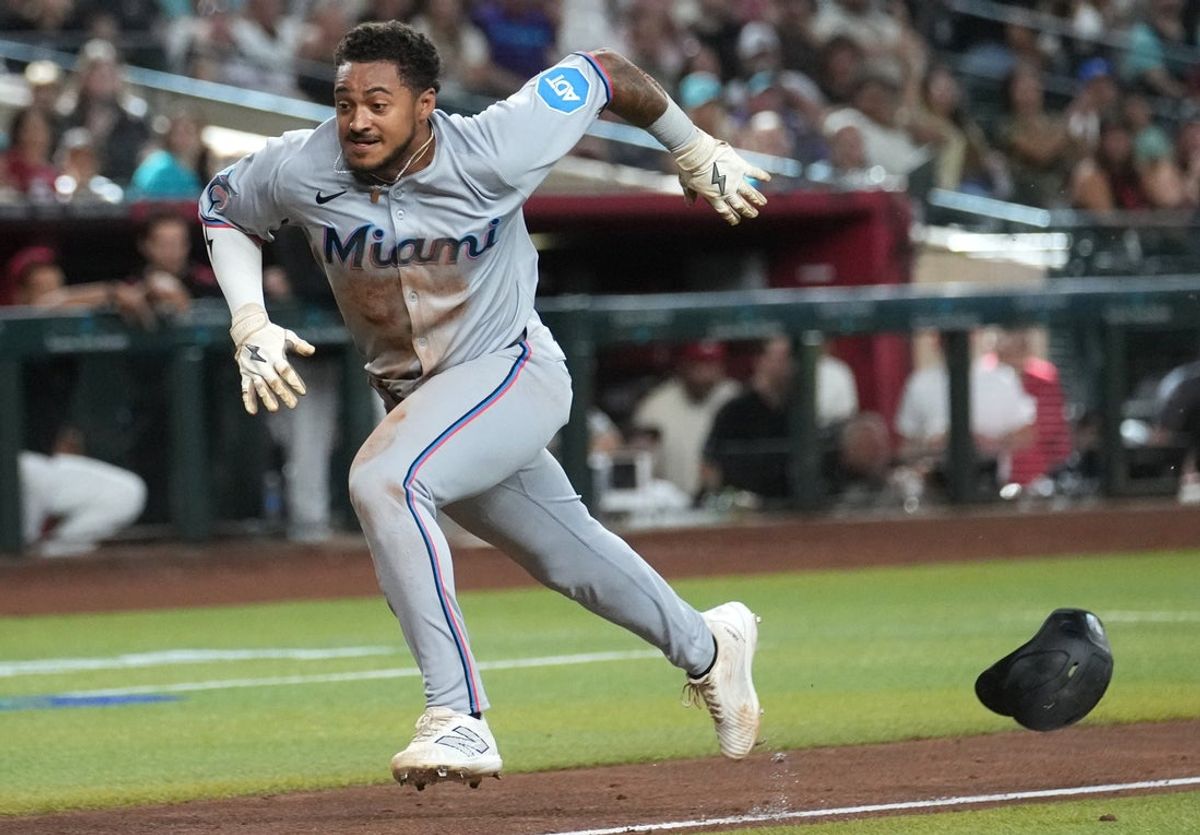 Miami Marlins base runner Dane Myers (54) races home to score and tie the game in the 9th inning against the Arizona Diamondbacks at Chase Field on Saturday, June 28, 2025.