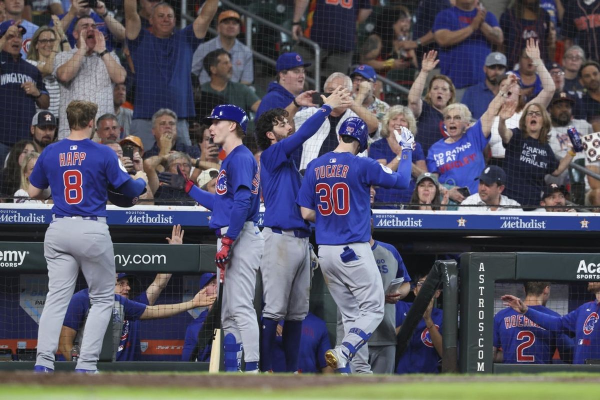 Jun 28, 2025; Houston, Texas, USA; Chicago Cubs right fielder Kyle Tucker (30) celebrates with teammates after hitting a home run during the fourth inning against the Houston Astros at Daikin Park. Mandatory Credit: Troy Taormina-Imagn Images
