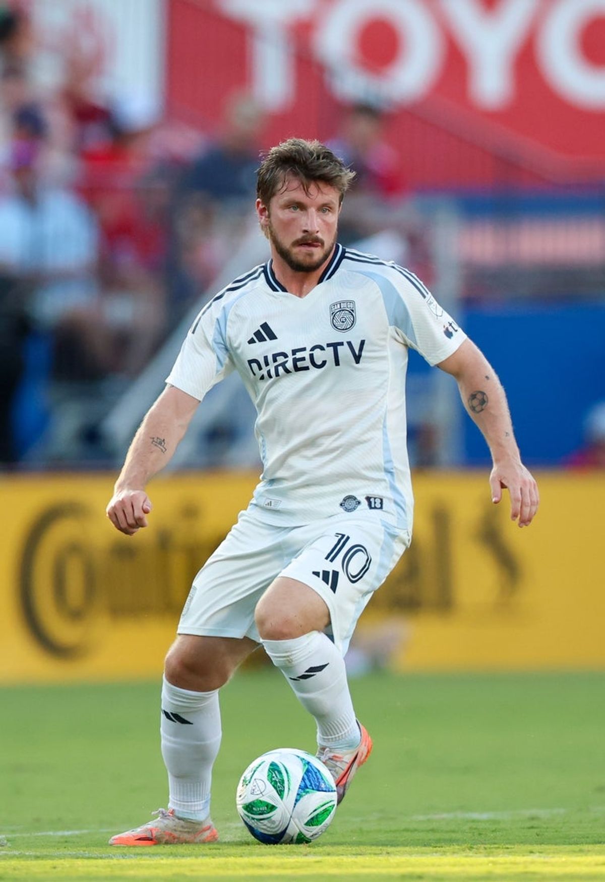 Jun 28, 2025; Frisco, Texas, USA;  San Diego FC midfielder Anders Dreyer (10) dribbles the ball during the first half against  FC Dallas at Toyota Stadium. Mandatory Credit: Kevin Jairaj-Imagn Images