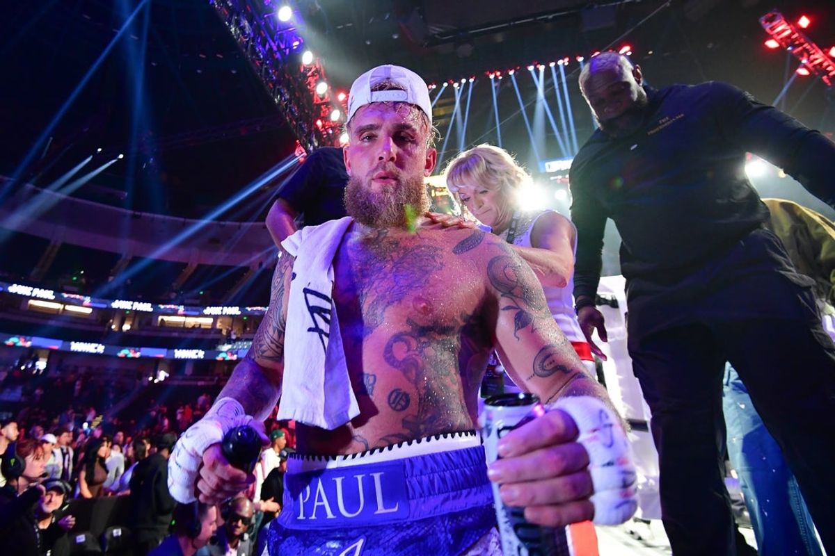 Jun 28, 2025; Anaheim, California, USA;  Jake Paul leaves the ring following his victory against Julio Cesar Chavez Jr. at Honda Center. Mandatory Credit: Gary A. Vasquez-Imagn Images