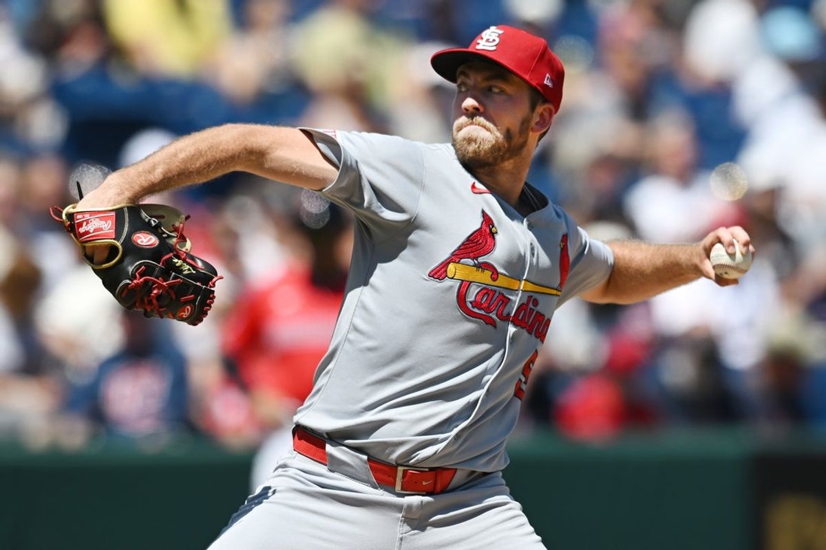 Jun 29, 2025; Cleveland, Ohio, USA; St. Louis Cardinals starting pitcher Matthew Liberatore (52) throws a pitch during the first inning against the Cleveland Guardians at Progressive Field. Mandatory Credit: Ken Blaze-Imagn Images