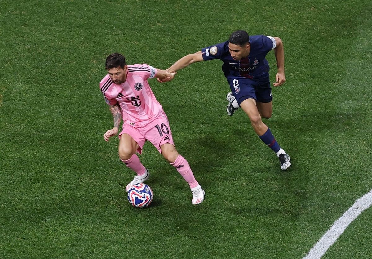 [Subscription Customers Only] Jun 29, 2025; Atlanta, Georgia, USA; Inter Miami FC forward Lionel Messi (10) kicks the ball past Paris Saint-Germain midfielder Fabian Ruiz (8) during a round of 16 match of the 2025 FIFA Club World Cup at Mercedes-Benz Stadium. Mandatory Credit: Amanda Perobelli-Reuters via Imagn Images