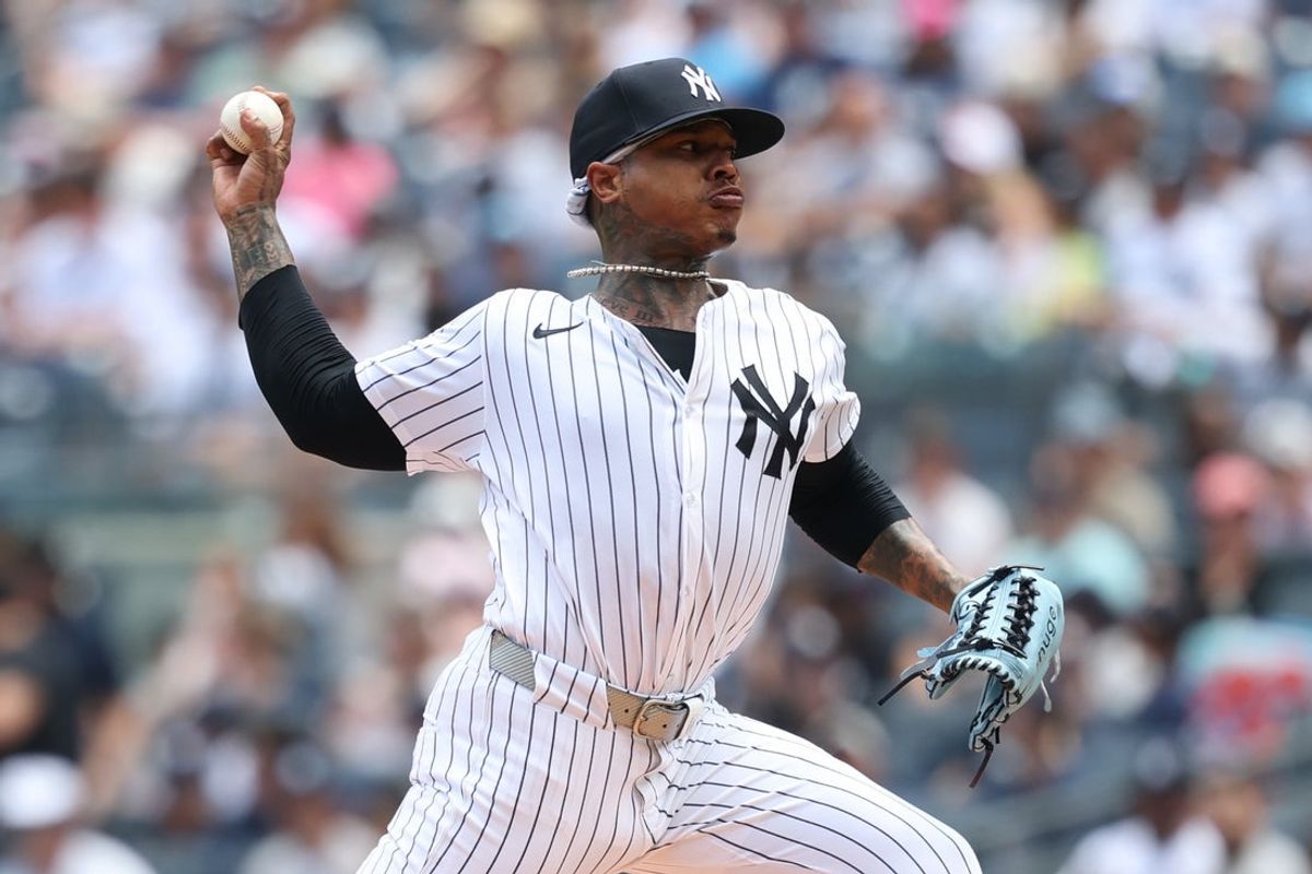 Jun 29, 2025; Bronx, New York, USA; New York Yankees pitcher Marcus Stroman (0) delivers a pitch during the first inning against the Athletics at Yankee Stadium. Mandatory Credit: Vincent Carchietta-Imagn Images