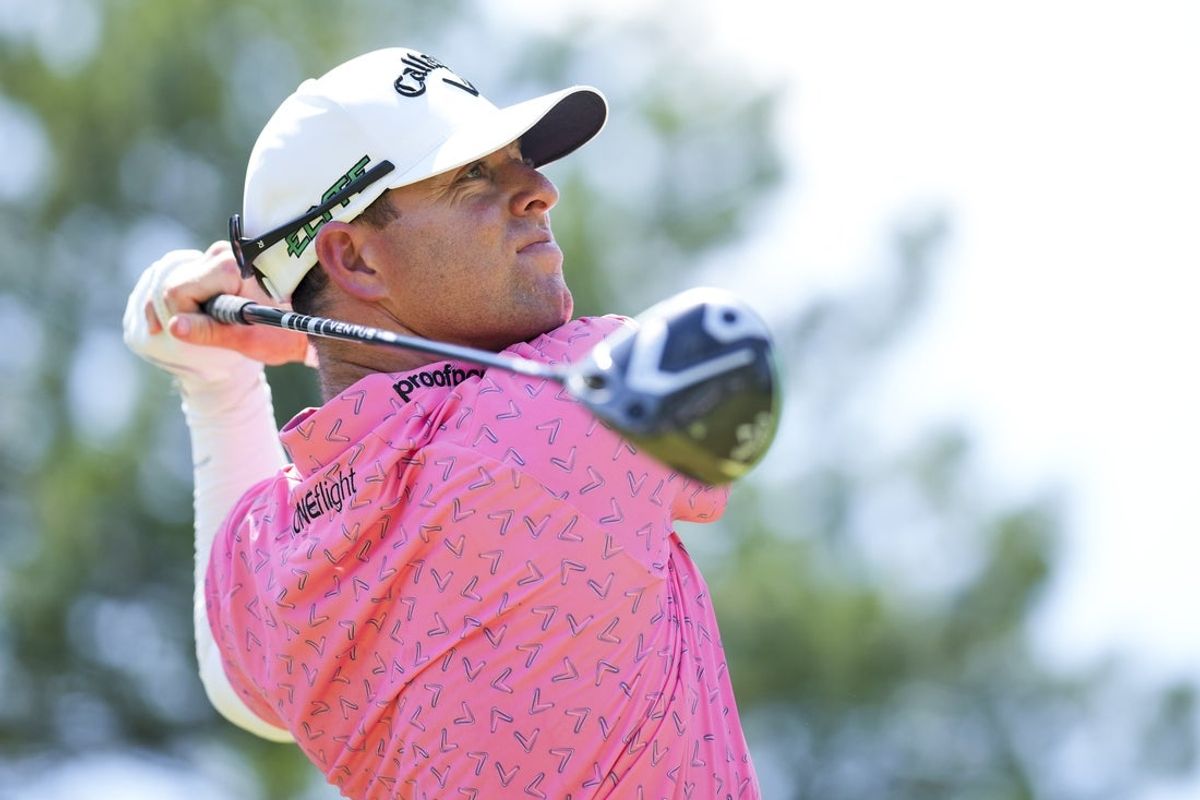 Jun 29, 2025; Detroit, Michigan, USA; Max Greyserman plays his shot from the fourth tee during the final round of the Rocket Mortgage Classic golf tournament. Mandatory Credit: Aaron Doster-Imagn Images