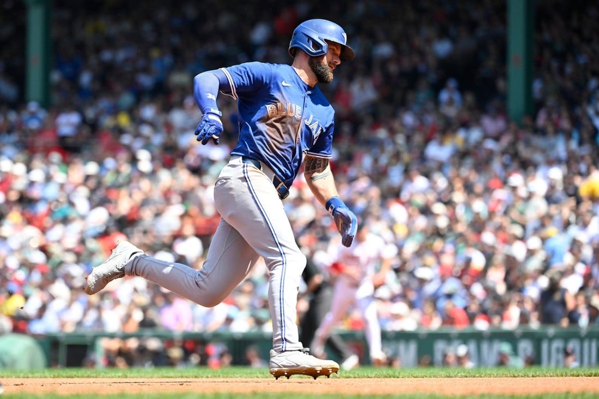 Jun 29, 2025; Boston, Massachusetts, USA; Toronto Blue Jays center fielder Nathan Lukes (38) scores a run off a one run RBI by second baseman Andres Gimenez (0) (not pictured) during the fourth inning against the Boston Red Sox at Fenway Park. Mandatory Credit: Eric Canha-Imagn Images