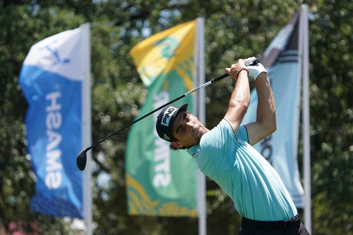 Jun 29, 2025; Carrollton, Texas, USA; Joaquin Niemann plays his shot from the tenth tee during the final round of the LIV Golf Dallas golf tournament at Maridoe Golf Club. Mandatory Credit: Raymond Carlin III-Imagn Images
